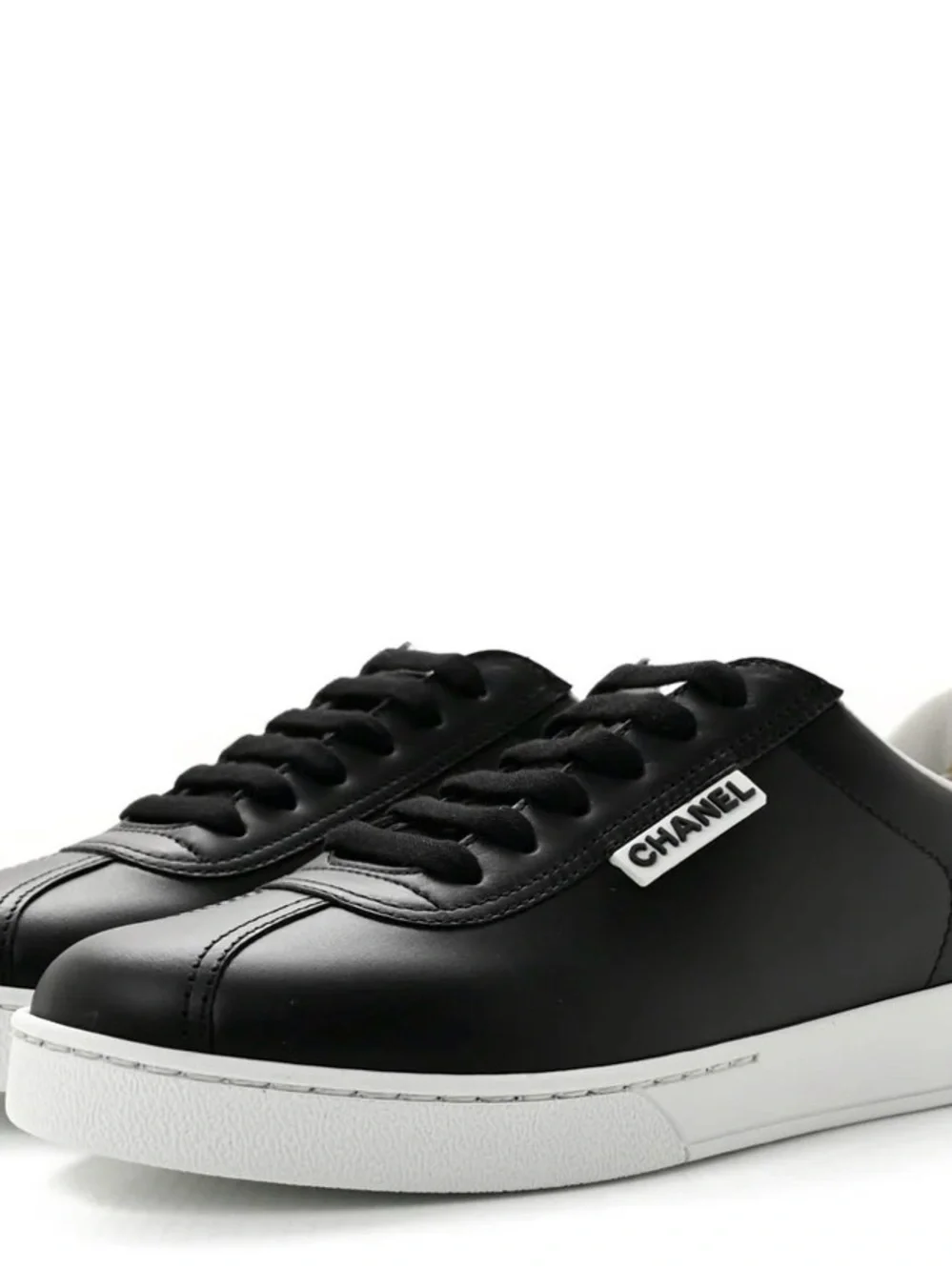 CHANEL Black Leather Low-Top Sneaker with White Sole